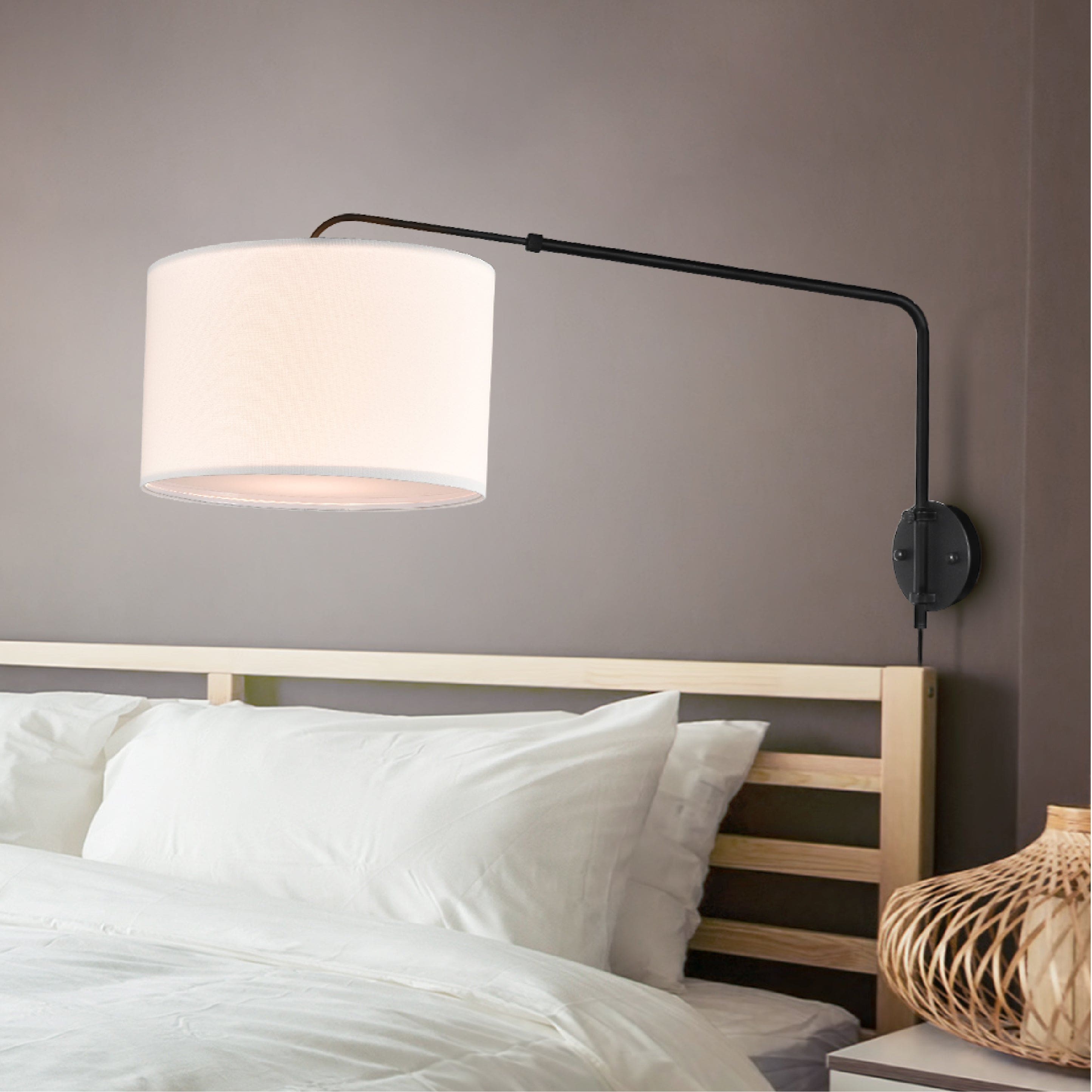 Coby Wall Mount Light installed in a bedroom setting