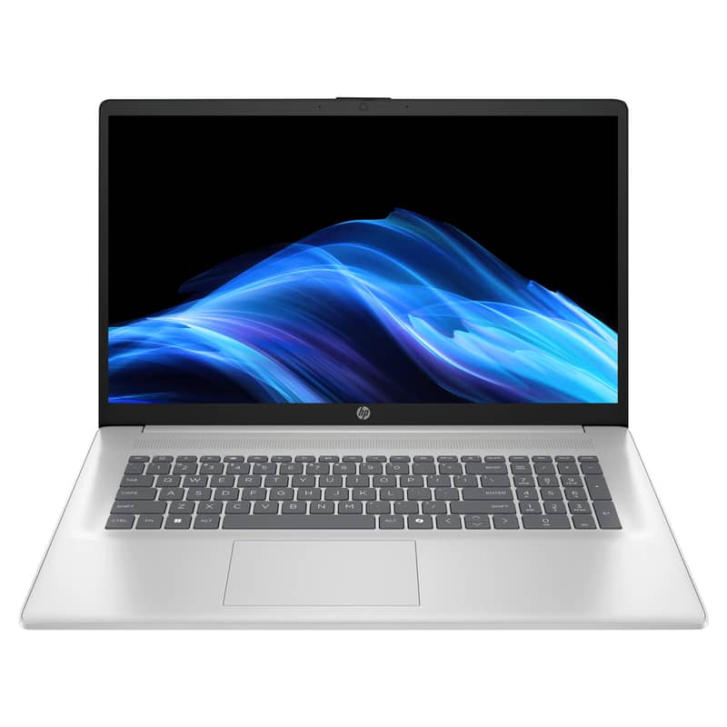 HP 17.3 FHD Laptop displaying a business presentation on a desk